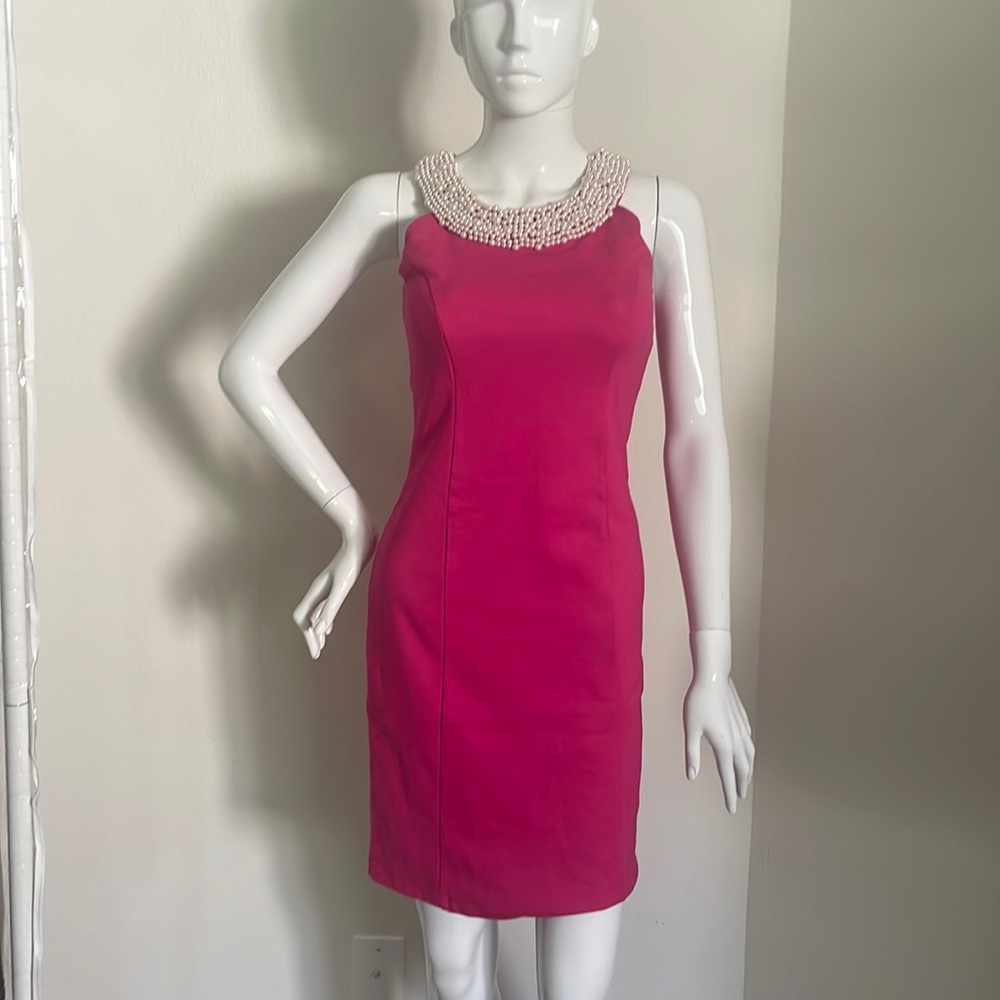 Sleeveless Hot Pink Dress w/Pearl embellishments at neck.